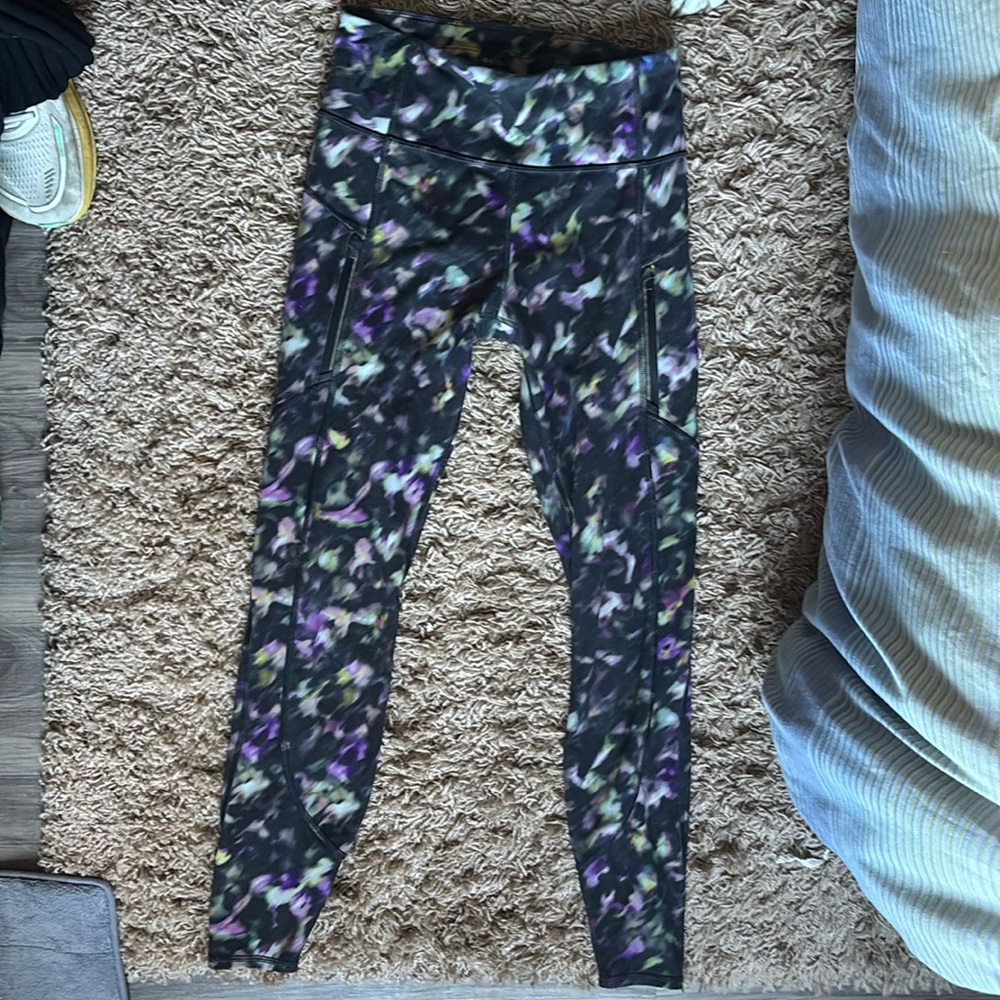 Athleta Leggings, marble color of purple, green, and white on black